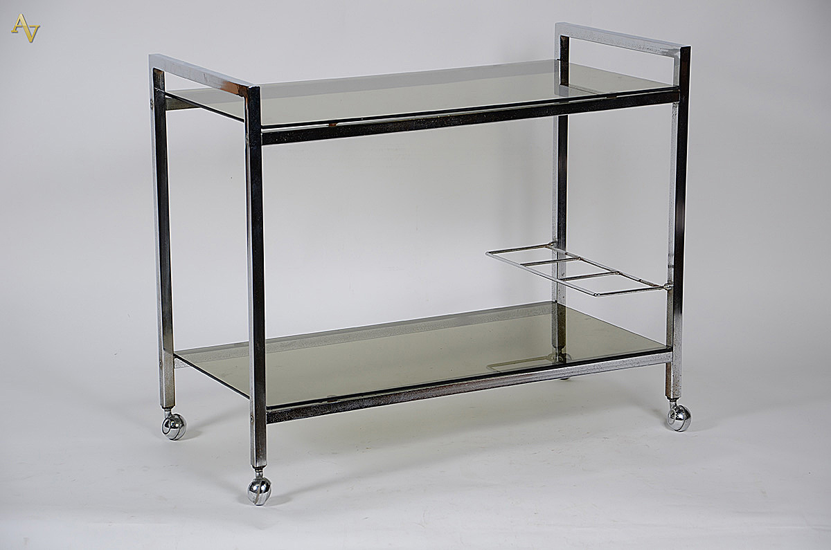 Mesa bar cromada com tampo de vidro. Medidas 79 x 40 x 65 cm
