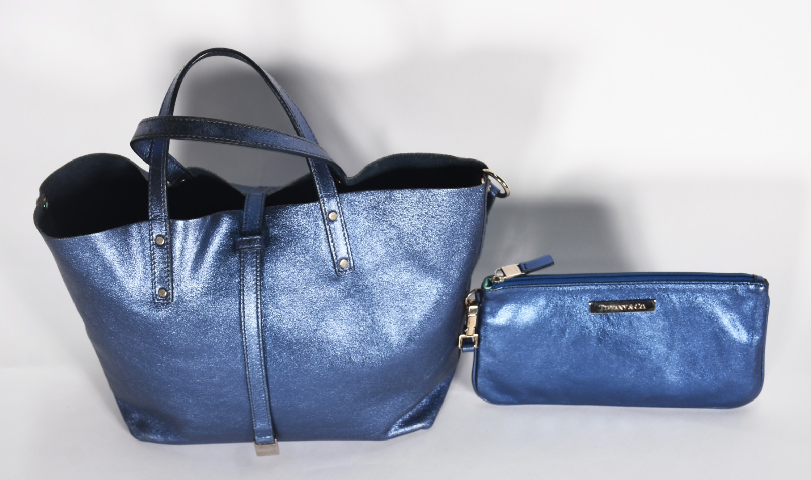 Bolsa e carteira da marca Tiffany, na embalagem original. - foto 3 de 11
