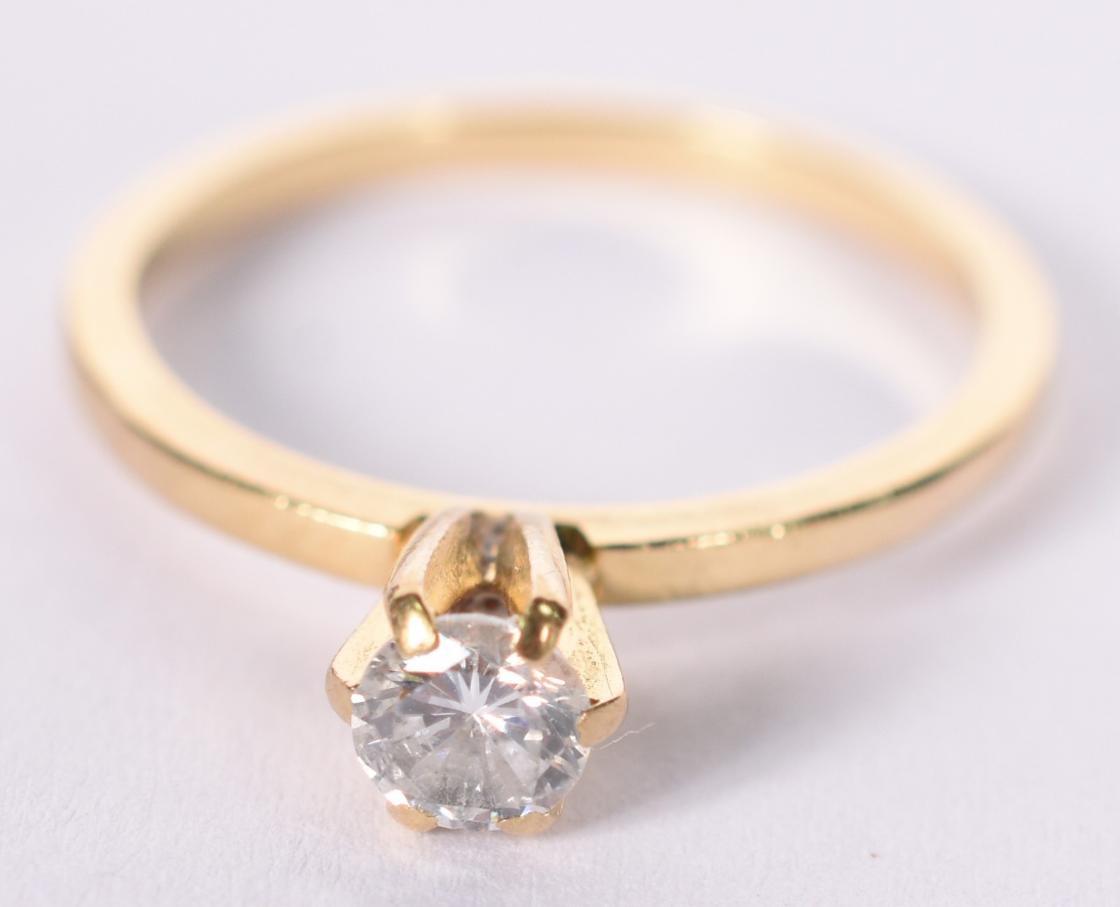 Solitário de ouro branco com um brilhante de 0,25 ct (Por motivos de... - foto 1 de 4