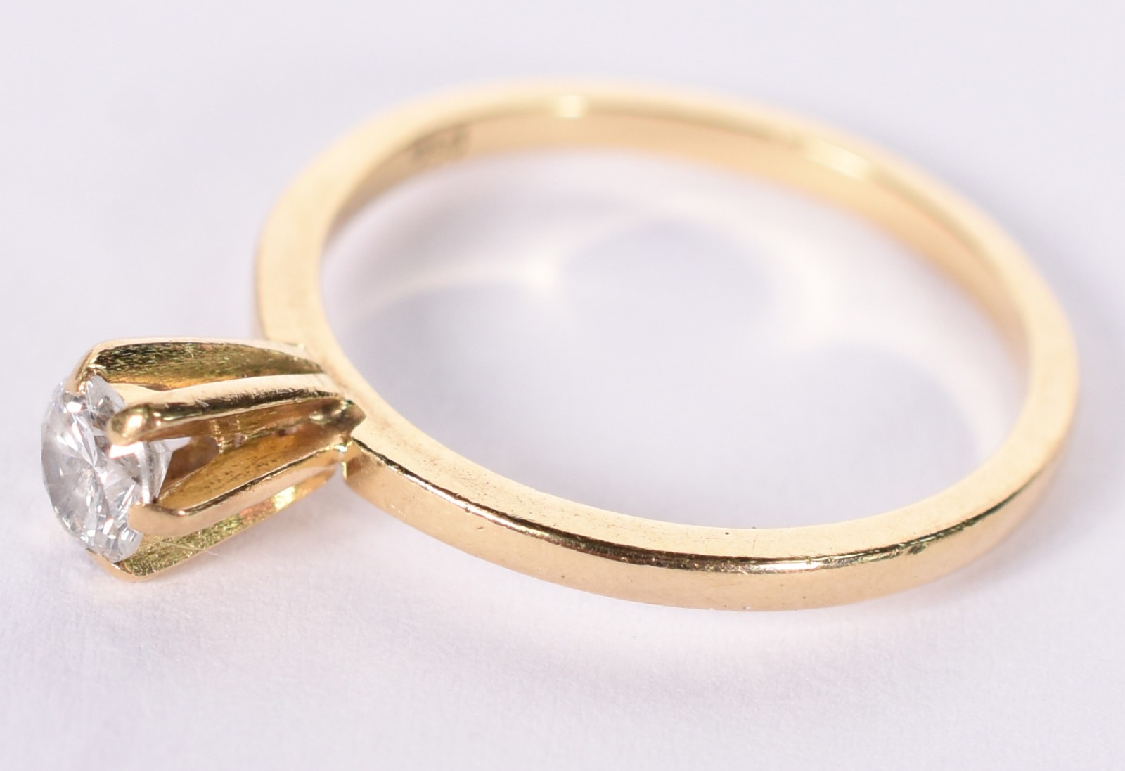 Solitário de ouro branco com um brilhante de 0,25 ct (Por motivos de... - foto 2 de 4