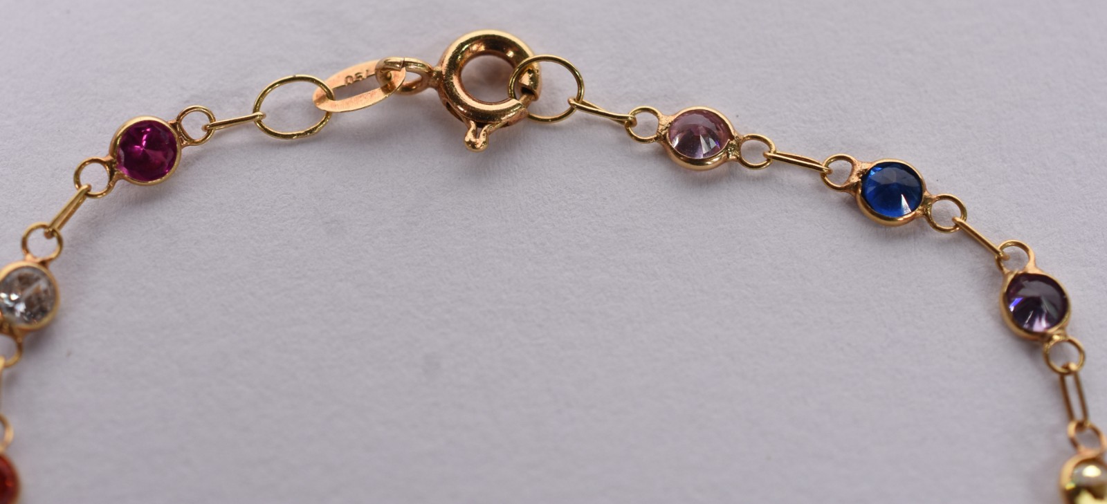 Pulseira de ouro 18 k com pedras coloridas (Por motivos de segurança... - foto 3 de 4