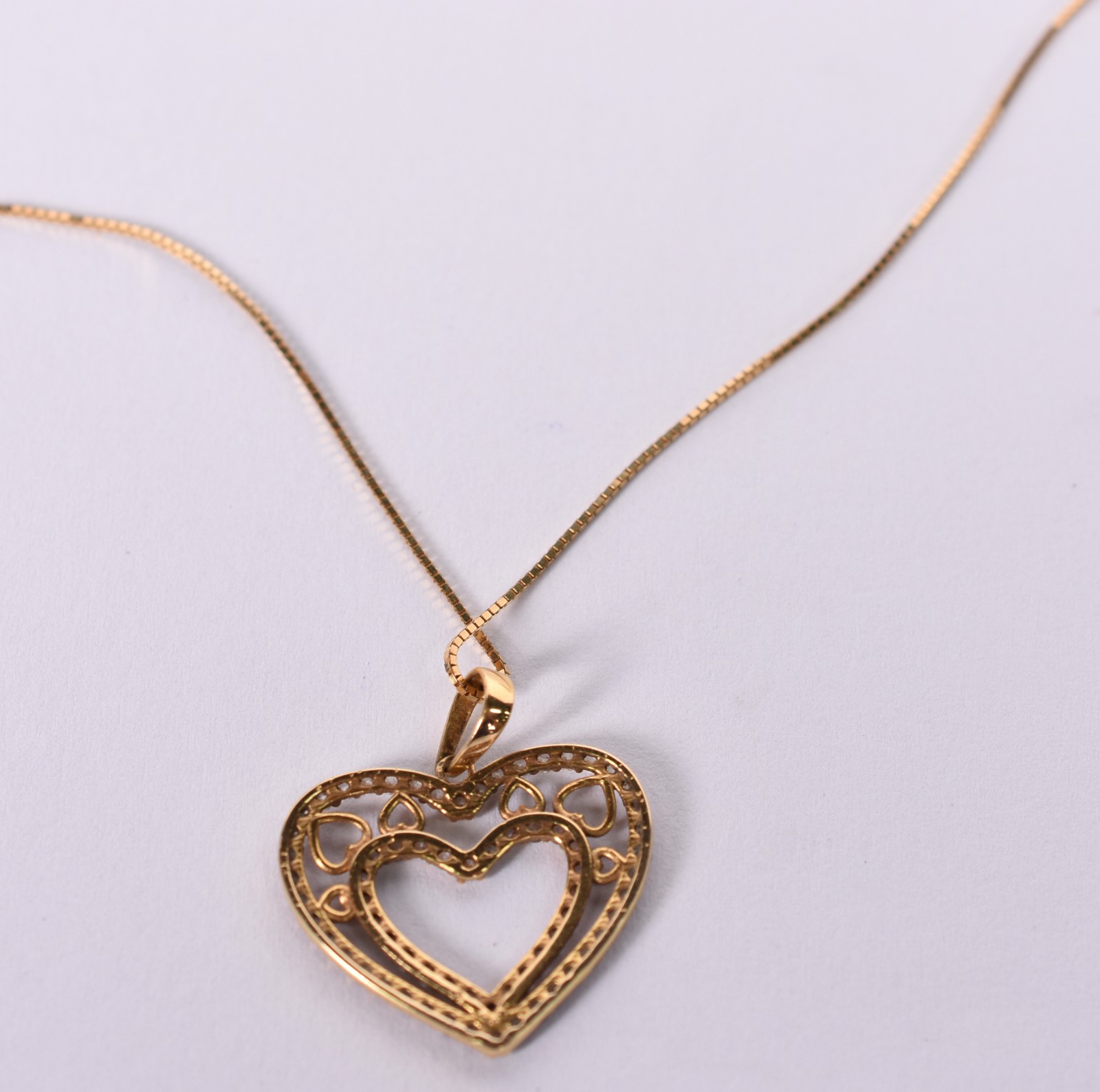 Gargantilha de ouro 18 k com pingente feitio coração (Por motivos de... - foto 4 de 4