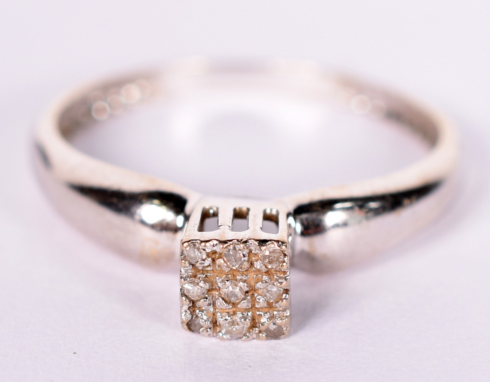 Anel de ouro branco feitio chuveiro com brilhantes, aro 18 (Por... - foto 1 de 4