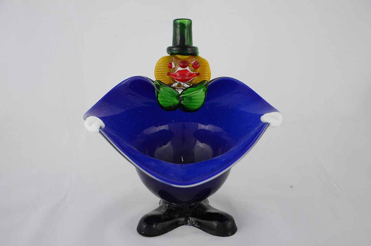 Baleiro na forma de palhaço de murano azul, altura 24 cm.