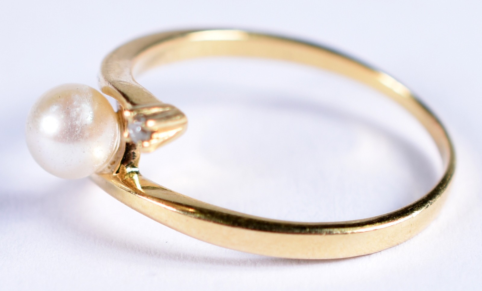 Anel de ouro 18 k com perola e 1 brilhante, aro 17 (Por motivos de... - foto 2 de 3