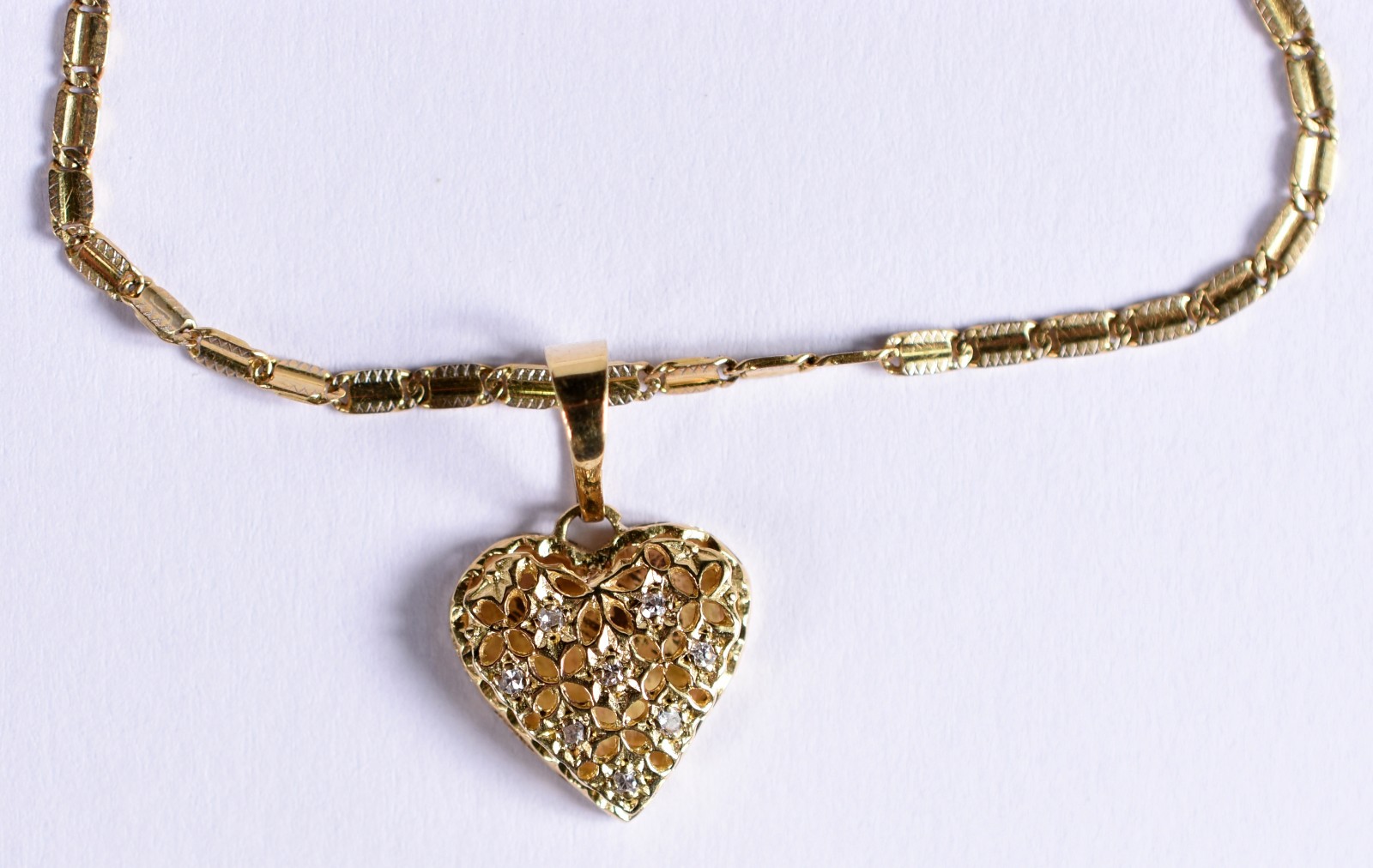 Pulseira de ouro contraste 750 e pingente com brilhante (Por motivos... - foto 1 de 4
