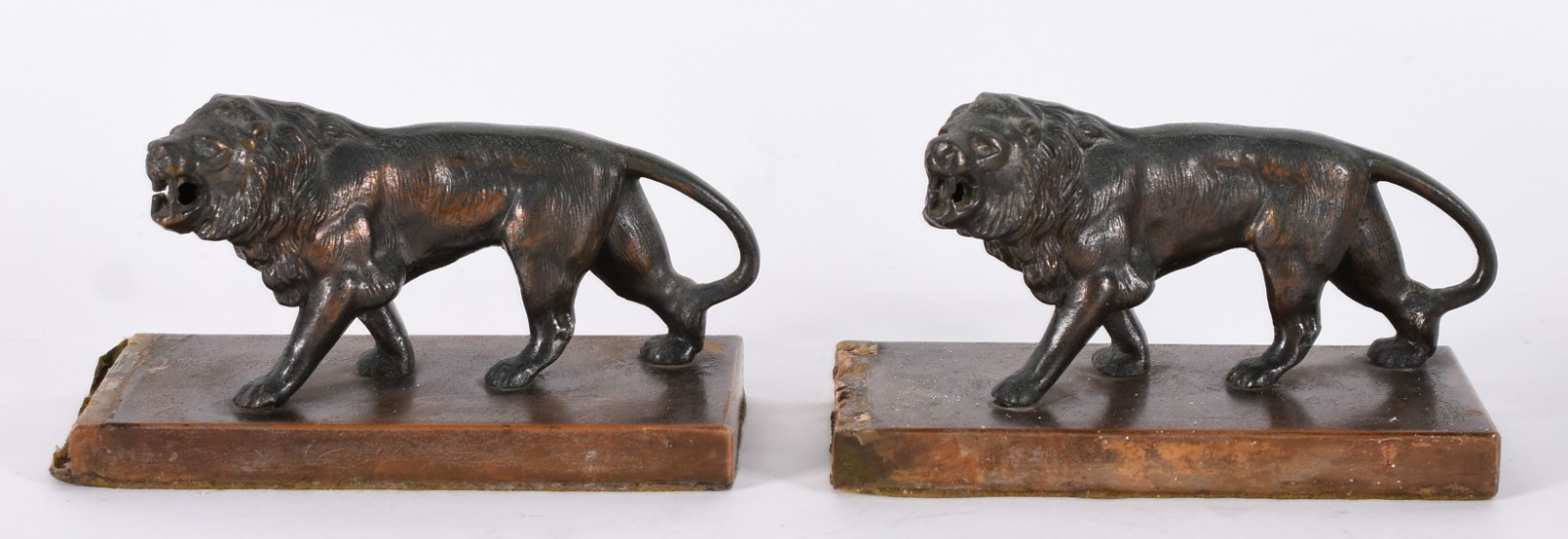 Serre livres representando par de leões de petit bronze, faltando... - foto 1 de 7