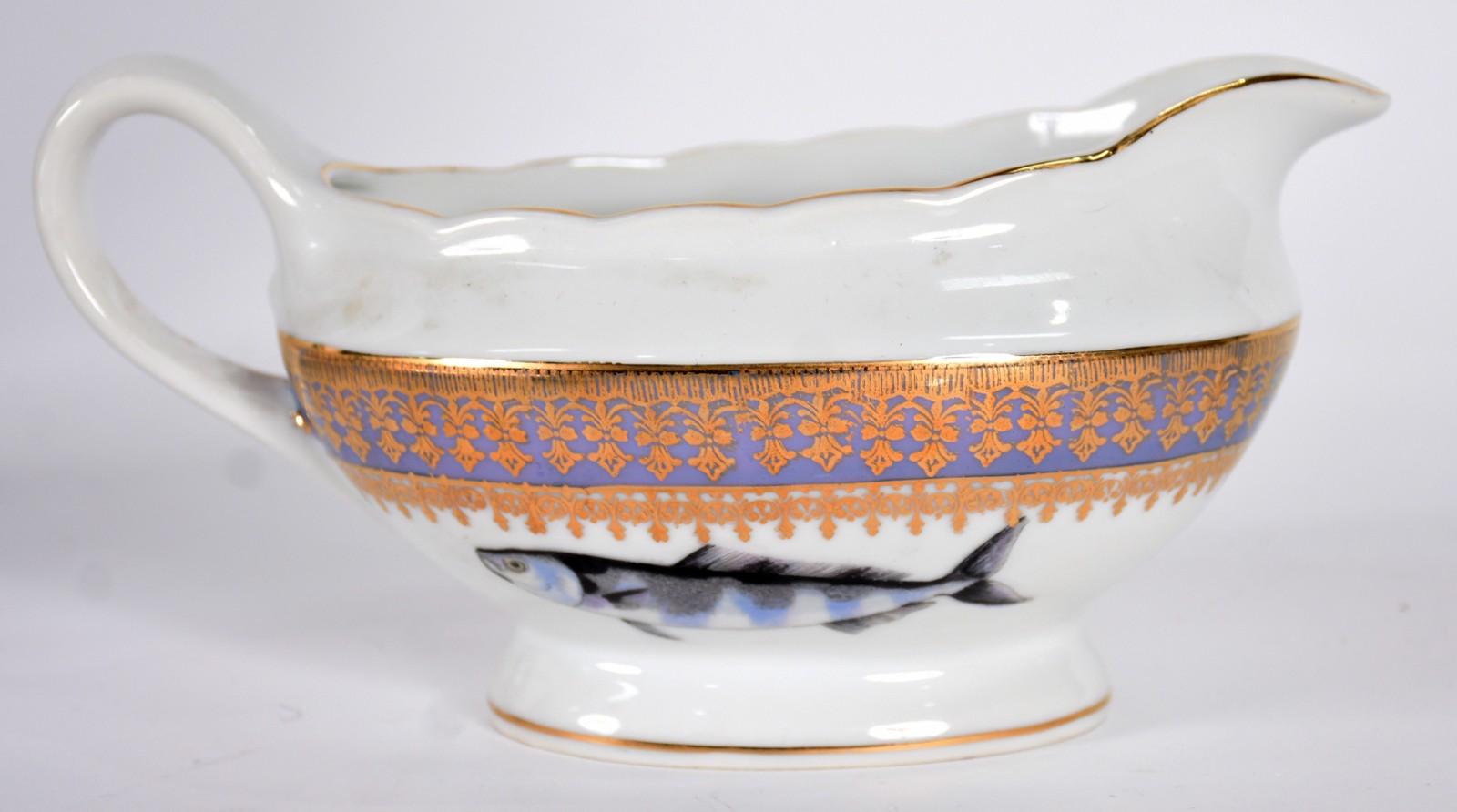 Aparelho para peixe de porcelana Nacional composto de 12 pratos... - foto 3 de 4