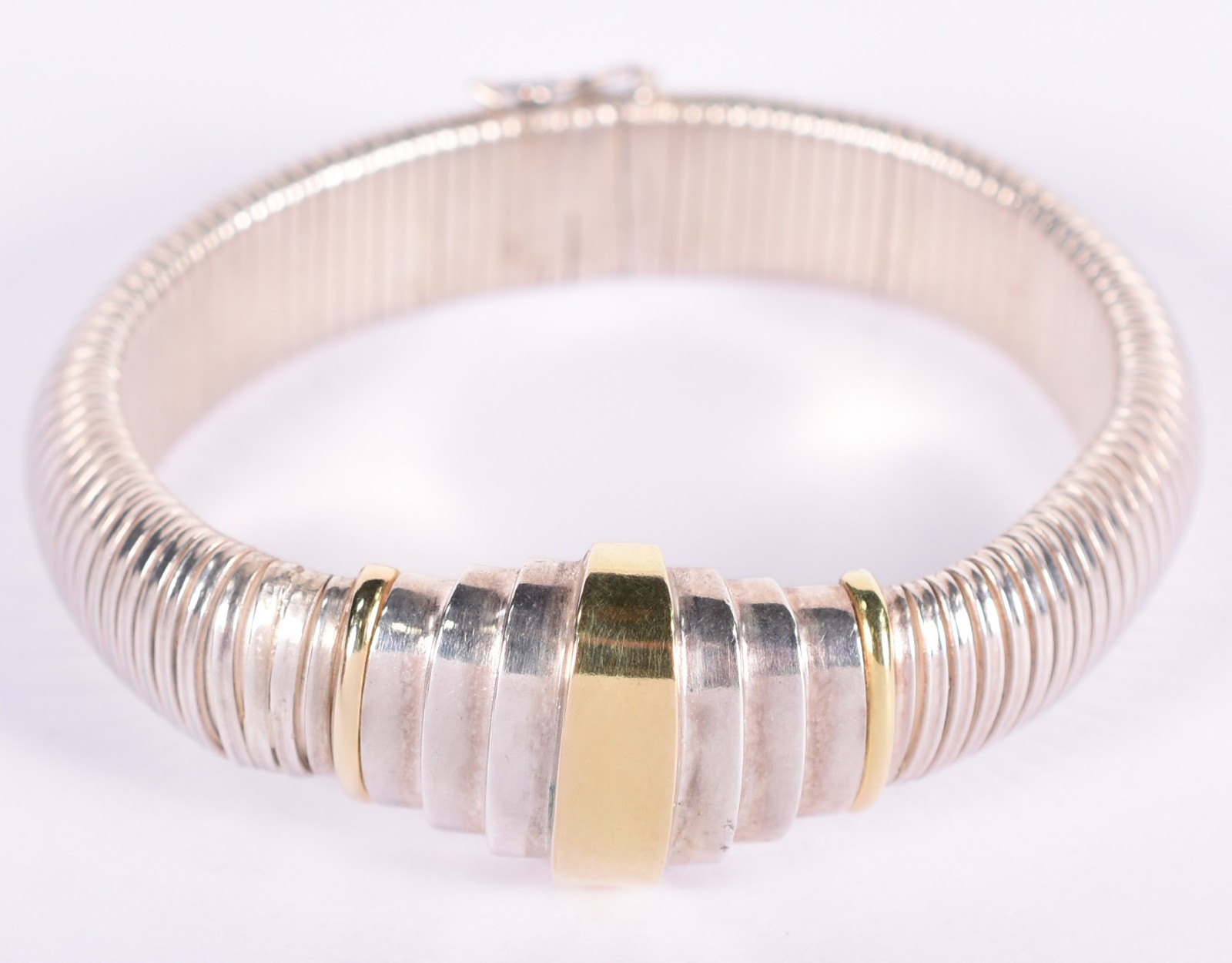Pulseira feitio mola em prata de lei com detalhes em ouro (Por... - foto 1 de 5