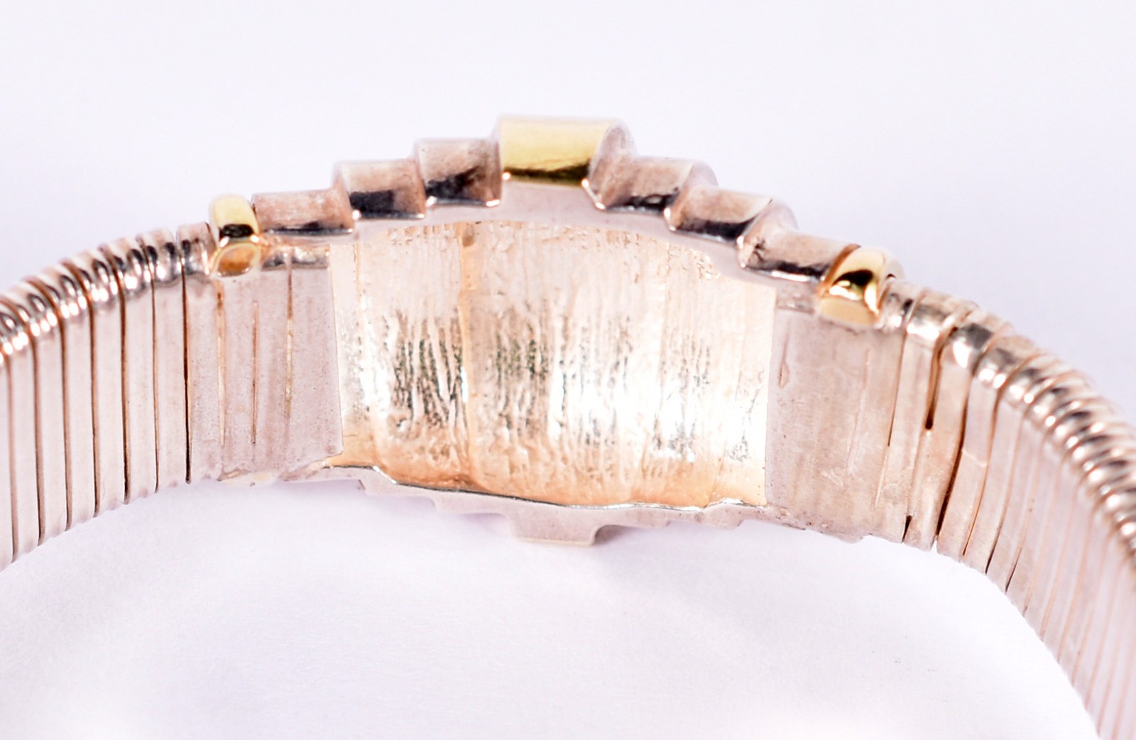 Pulseira feitio mola em prata de lei com detalhes em ouro (Por... - foto 2 de 5