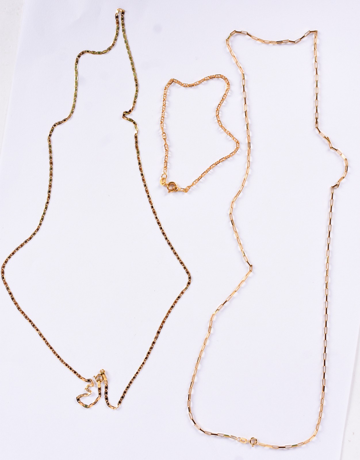 Conjunto composto de 2 cordões e pulseira em ouro 18 k contrastados... - foto 2 de 4