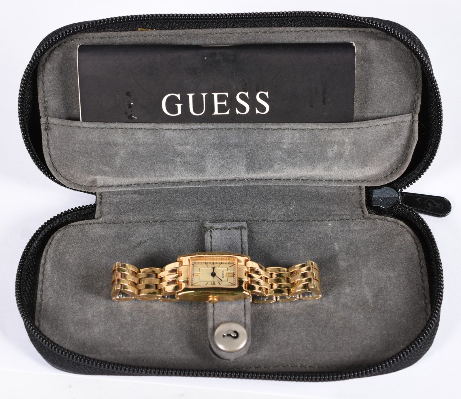 Relógio GUESS feminino, pulseira e número dourados (Por motivos de... - foto 5 de 7