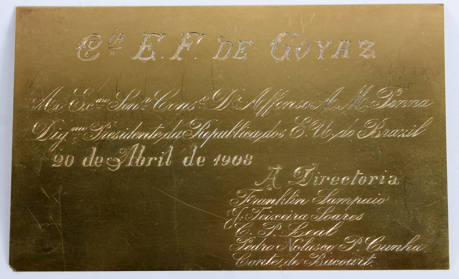 Placa de ouro 18 k., com inscrições. Peso 102 g. - foto 1 de 3