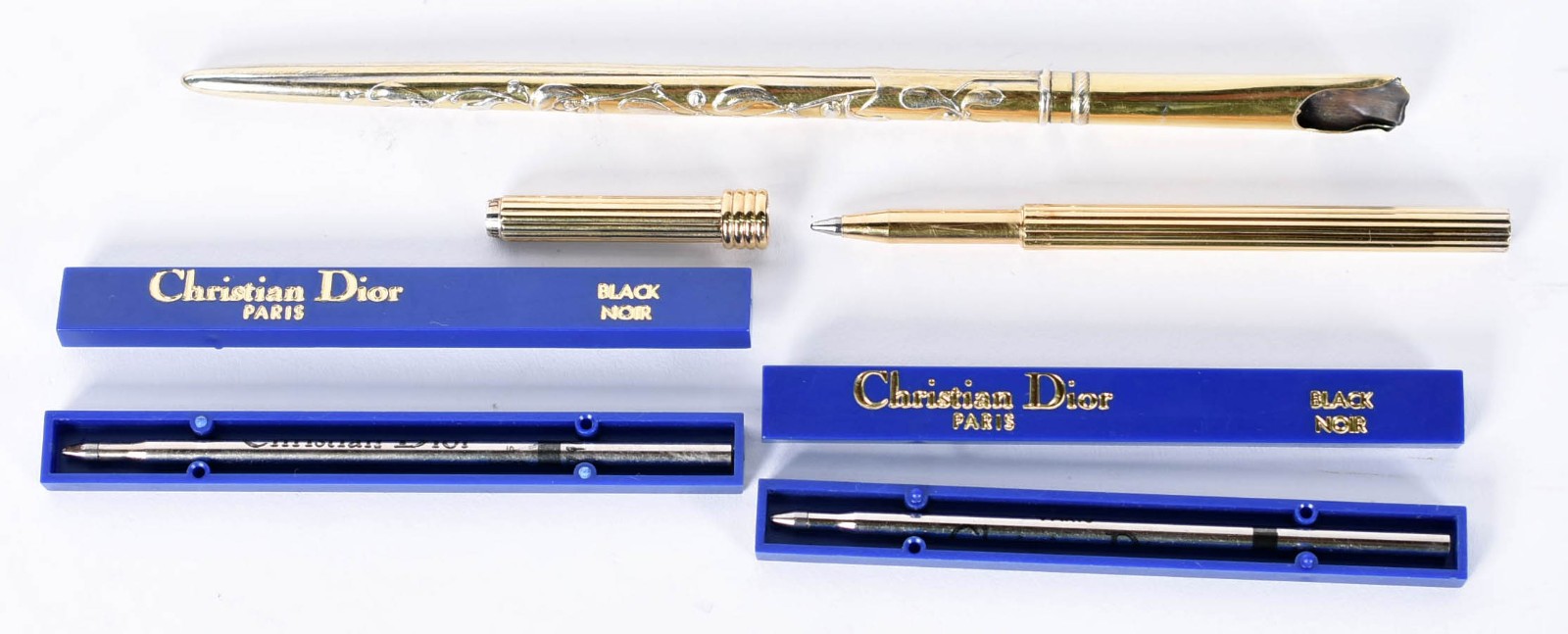 Duas peças, sendo uma mini caneta CHRISTIAN DIOR com duas cargas... - foto 1 de 4