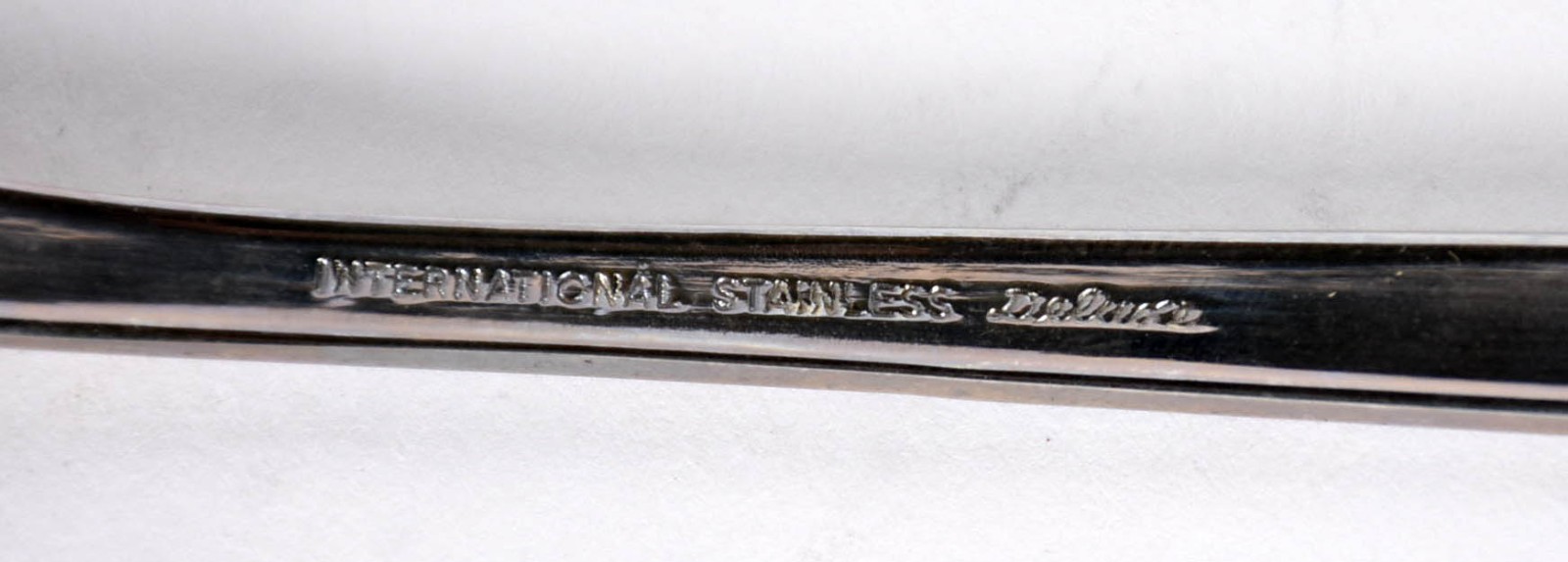 Faqueiro de aço inox com detalhes azuis no cabo composto de: 16... - foto 4 de 4