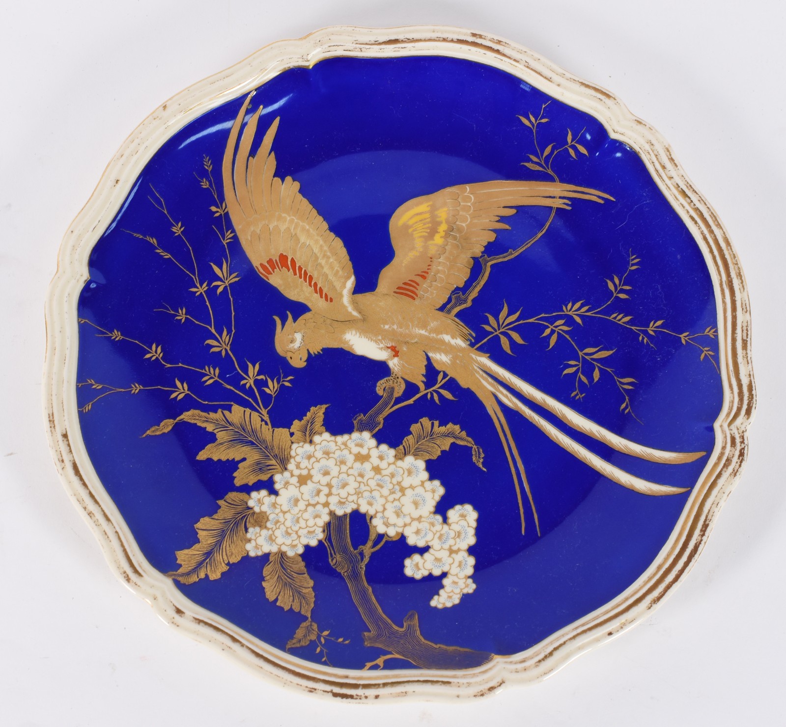 Medalhão de porcelana Rosenthal decorado com ave dourada sobre fundo... - foto 1 de 4