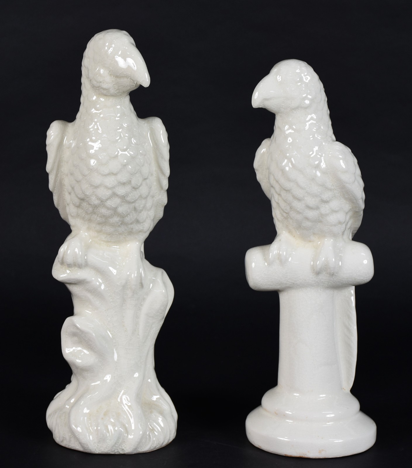Par de esculturas de cerâmica representando pássaros. - foto 1 de 4