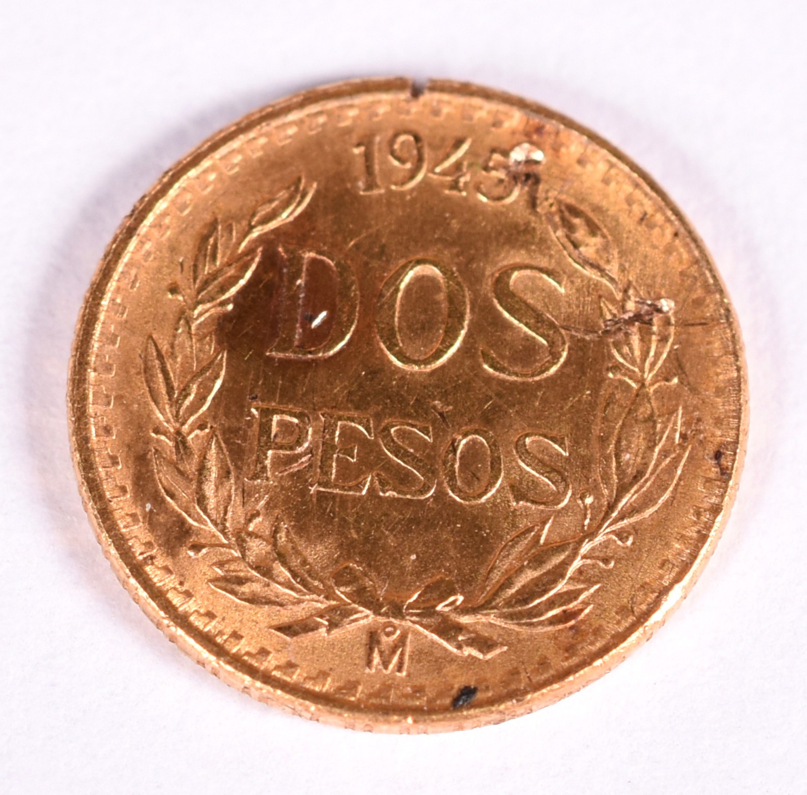 Antiga moeda mexicana, ano de 1945, teor 22 k (Por motivos de... - foto 1 de 4