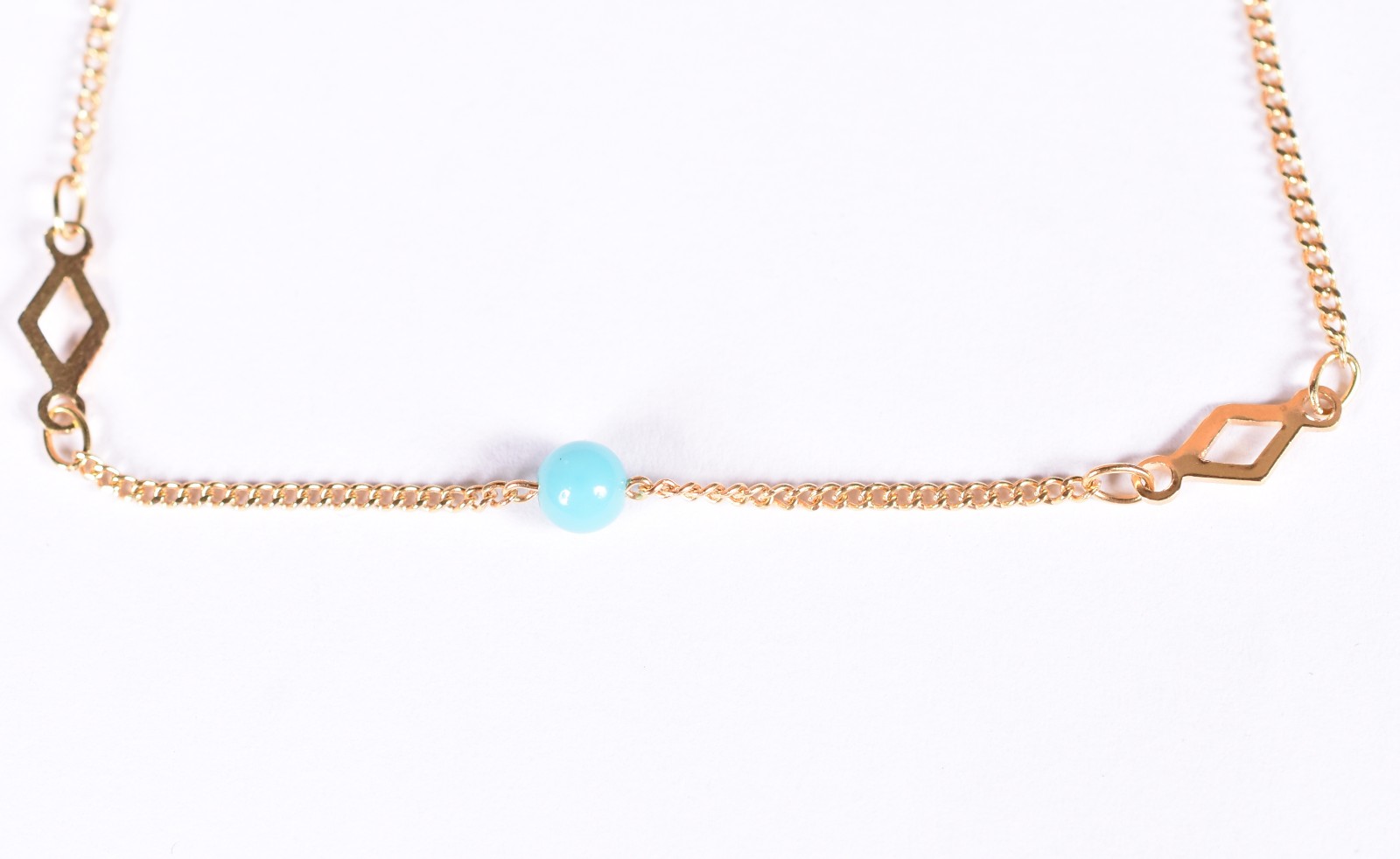 Pulseira em ouro 18 k, corrente, apresenta detalhes em turquesa (Por... - foto 1 de 4