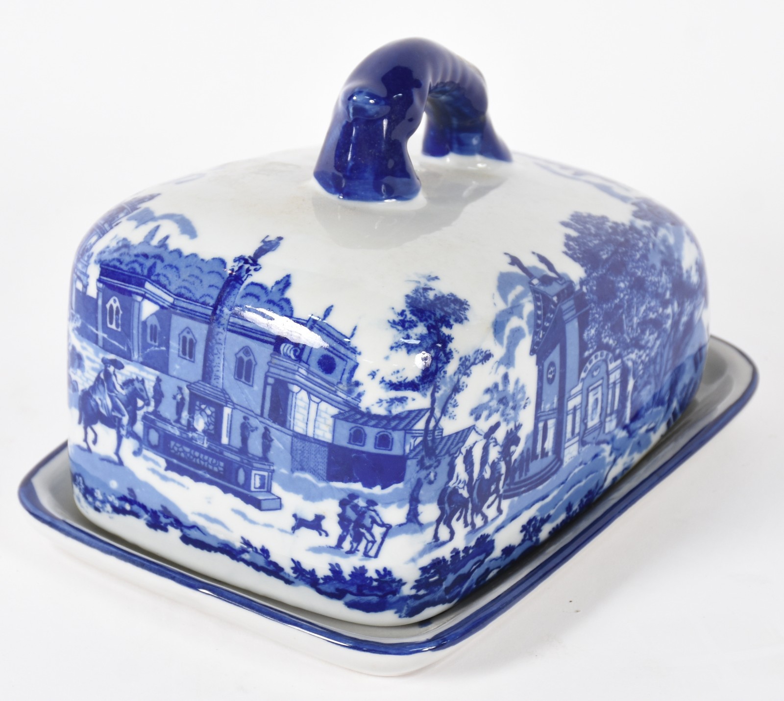 Manteigueira de porcelana decorada com paisagem em azul e branco. - foto 2 de 4