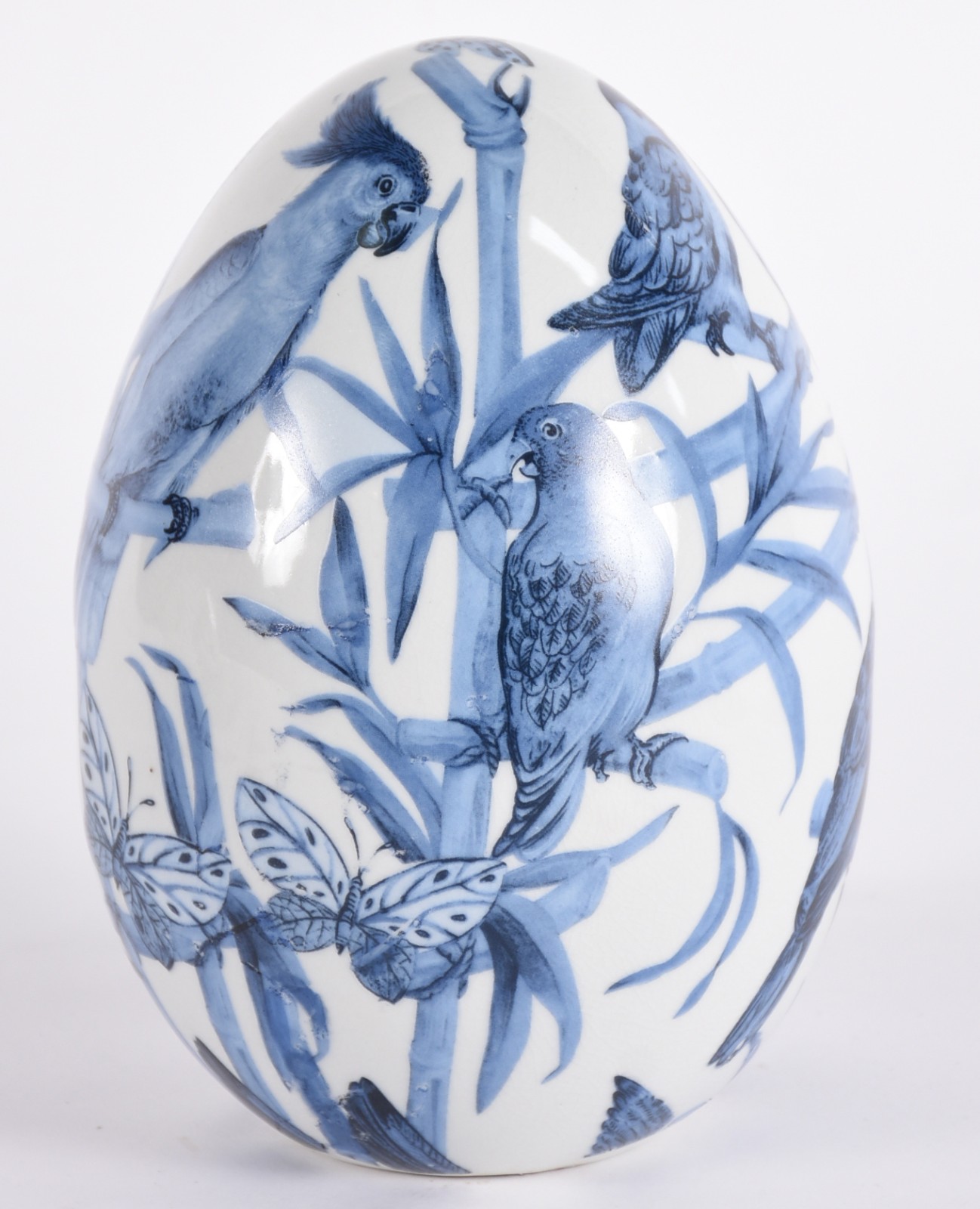Ovo/pinha de porcelana com pássaros azuis. - foto 1 de 3