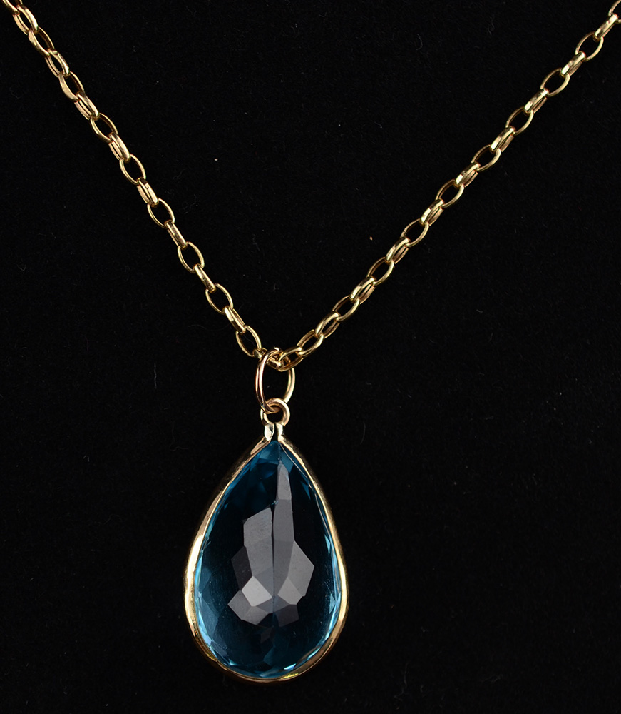 Cordão de ouro 18 k/ 750 com pingente de topázio azul com... - foto 1 de 3