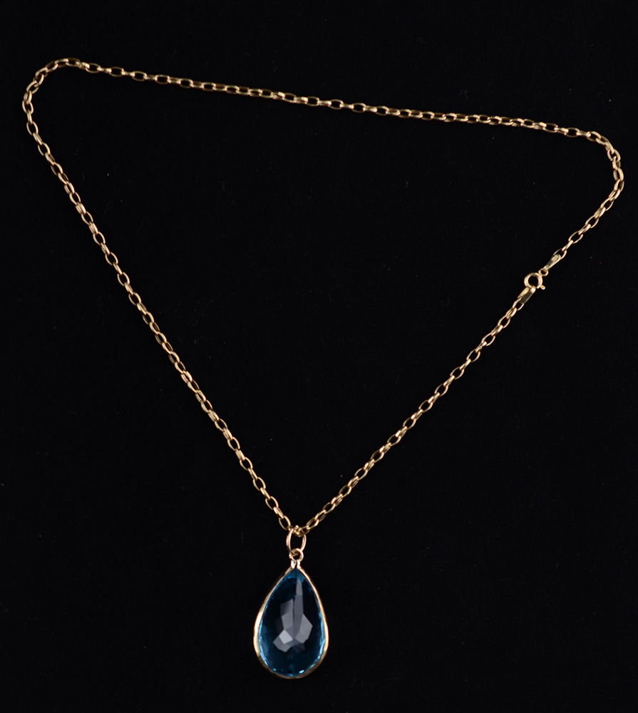 Cordão de ouro 18 k/ 750 com pingente de topázio azul com... - foto 2 de 3