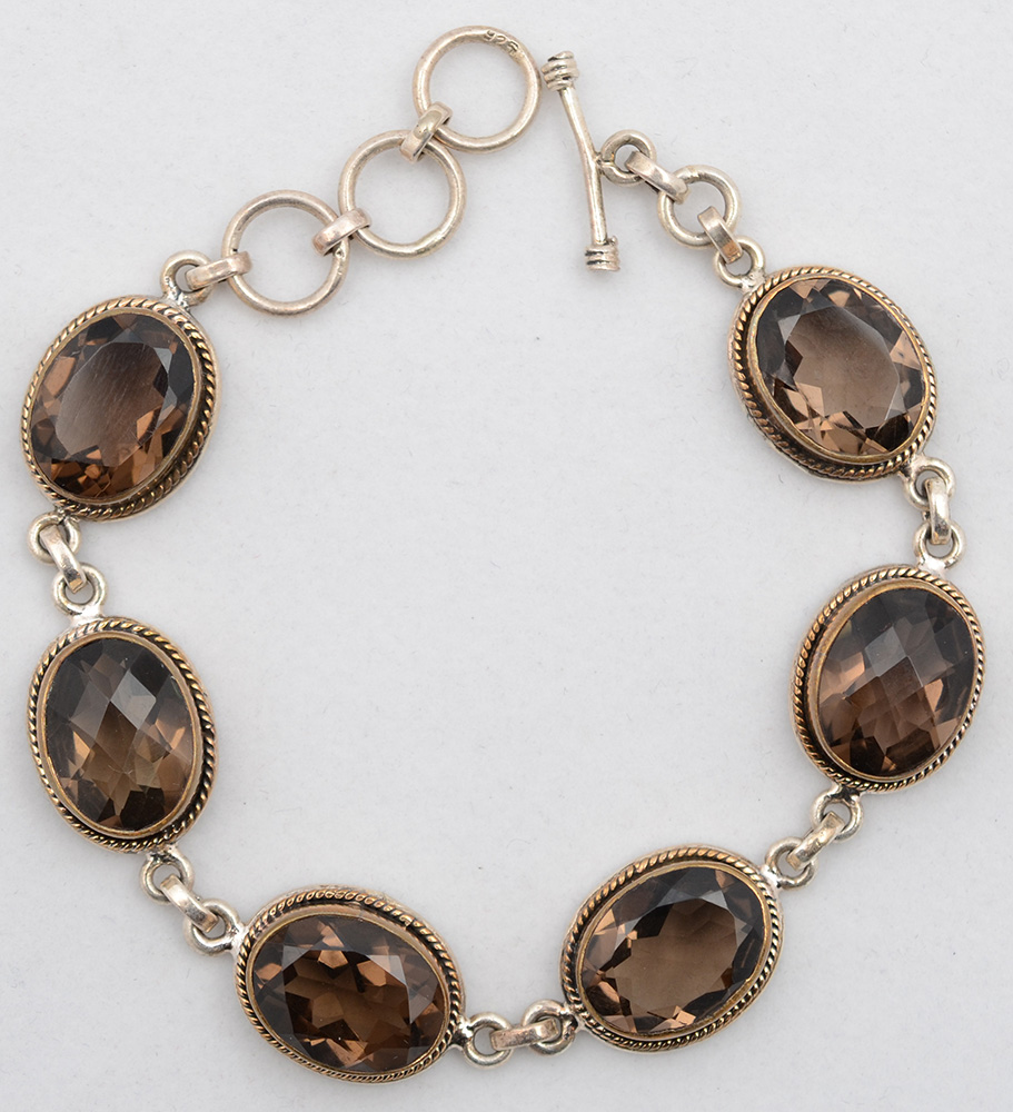 Pulseira de prata com topázio. Comprimento 22 cm.