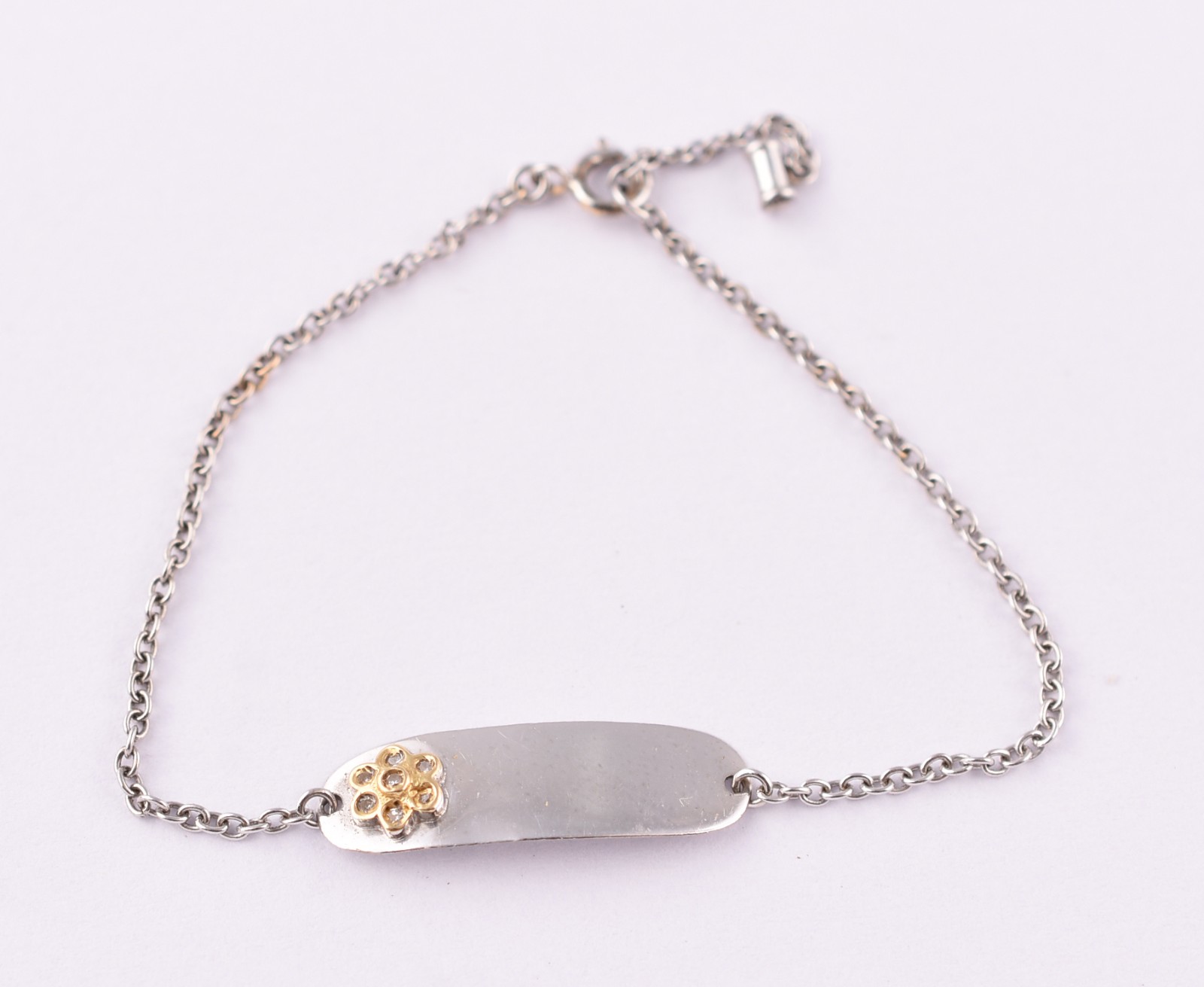 Pulseira de criança de ouro branco com mini brilhantes (Por motivos... - foto 1 de 6