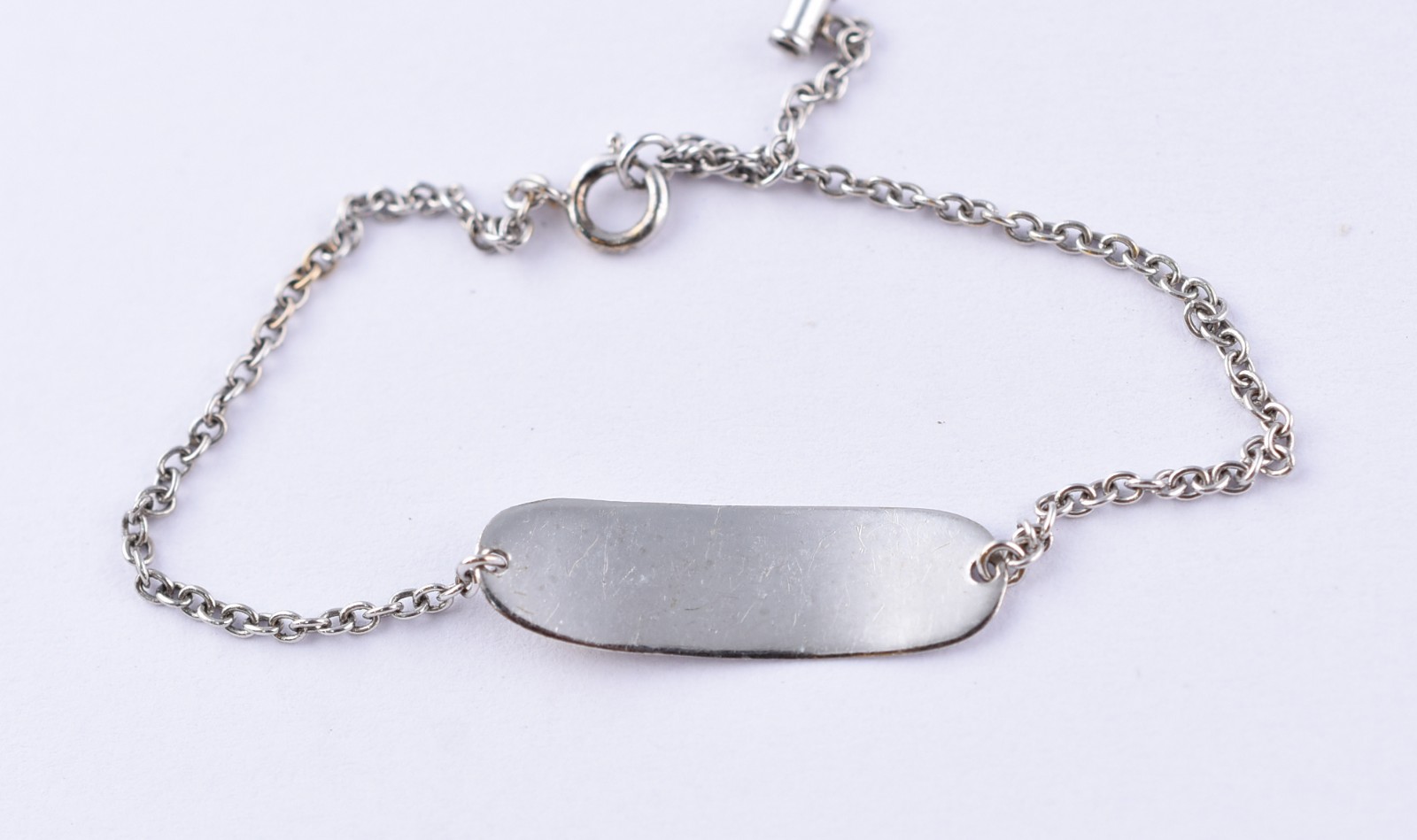 Pulseira de criança de ouro branco com mini brilhantes (Por motivos... - foto 2 de 6