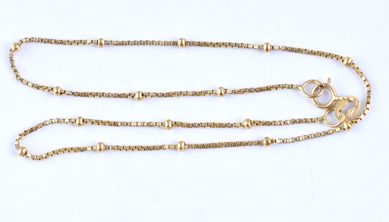 Tornozeleira veneziano em ouro 18k contrastada (Por questão de... - foto 1 de 3