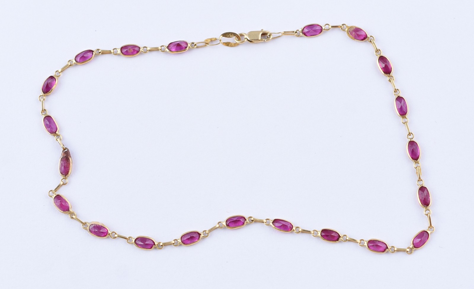 Tornozeleira de ouro 18 k com pedras vermelhas (Por motivos de... - foto 1 de 4