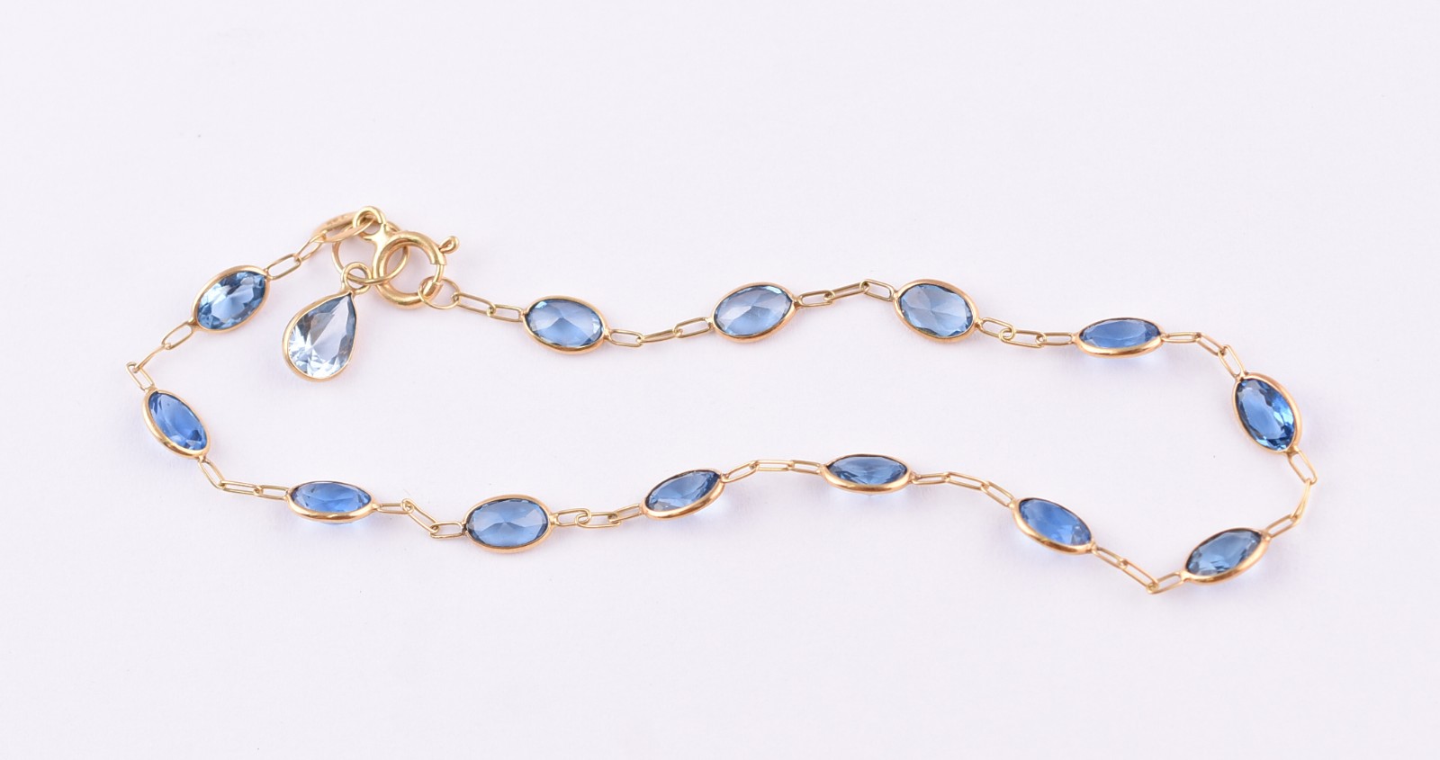 Pulseira de ouro 18 k com pedras azuis (Por motivos de seguranças as... - foto 3 de 4