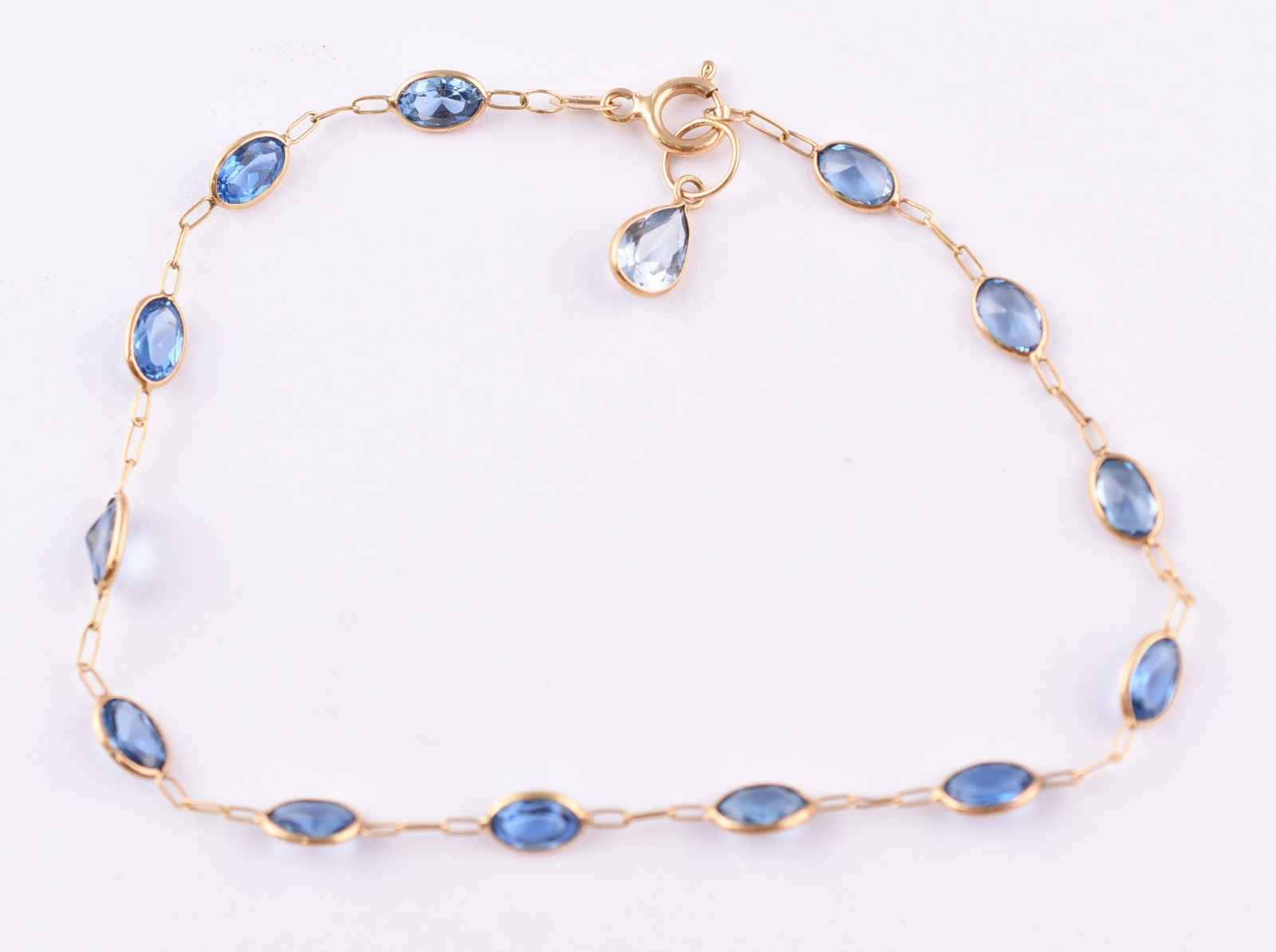 Pulseira de ouro 18 k com pedras azuis (Por motivos de seguranças as... - foto 1 de 4