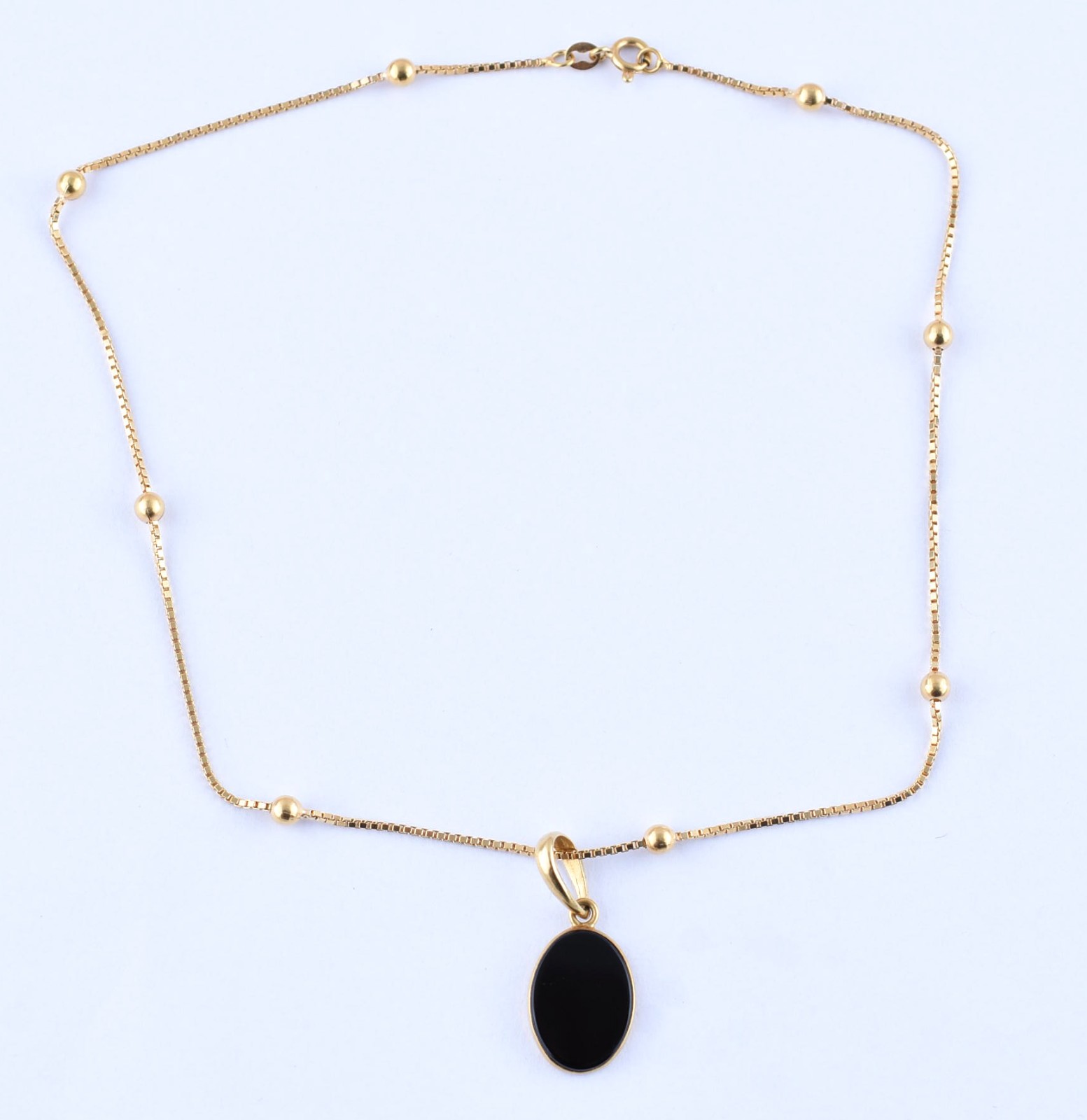 Colar de ouro 18 k com detalhes de bolinhas e pingente com pedra... - foto 2 de 4