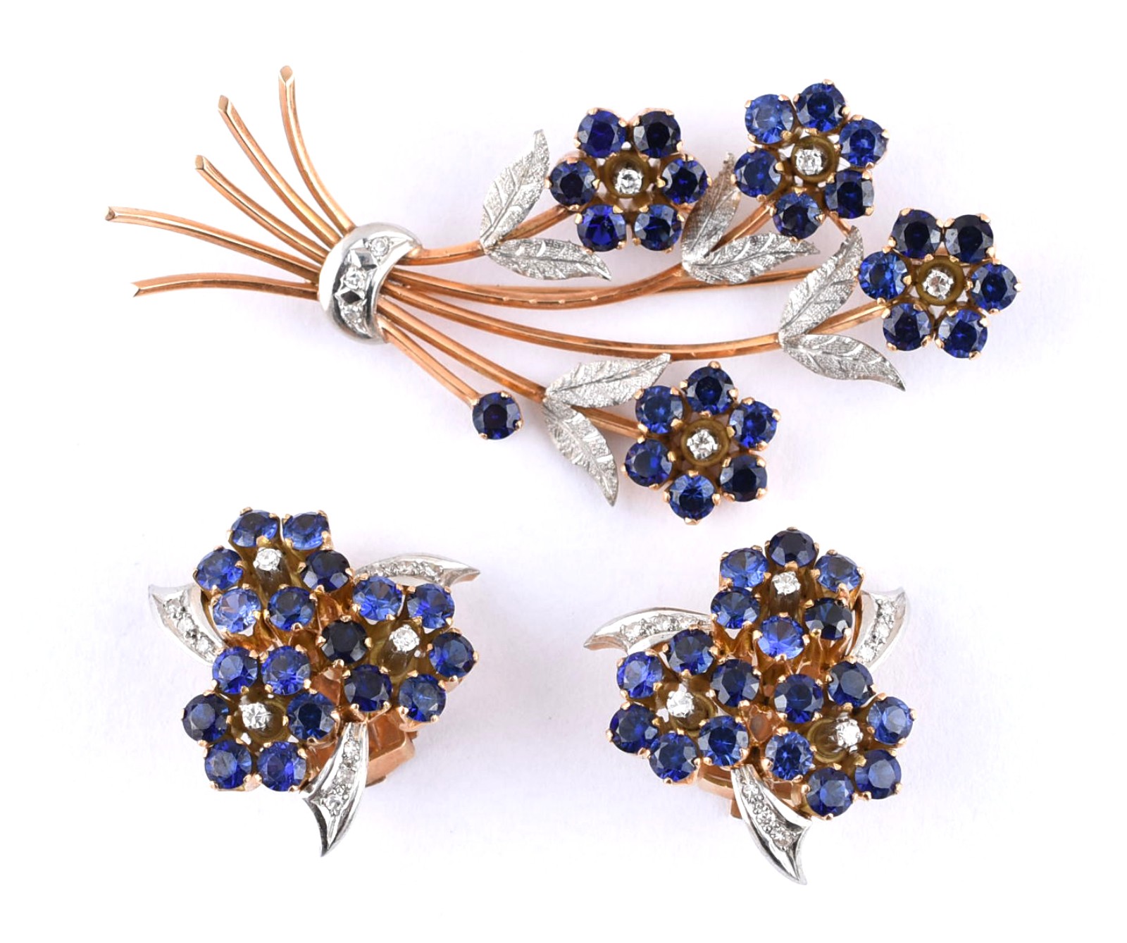 Conjunto de ouro 18 k e platina composto de broche e par de brincos... - foto 1 de 2