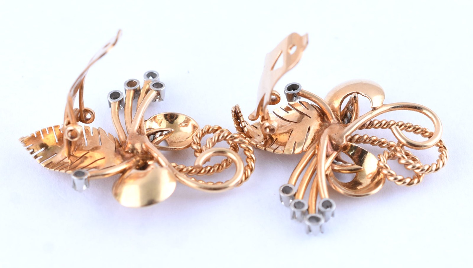 Par de brincos de ouro 18k de pressão com detalhes cravejados de... - foto 3 de 3