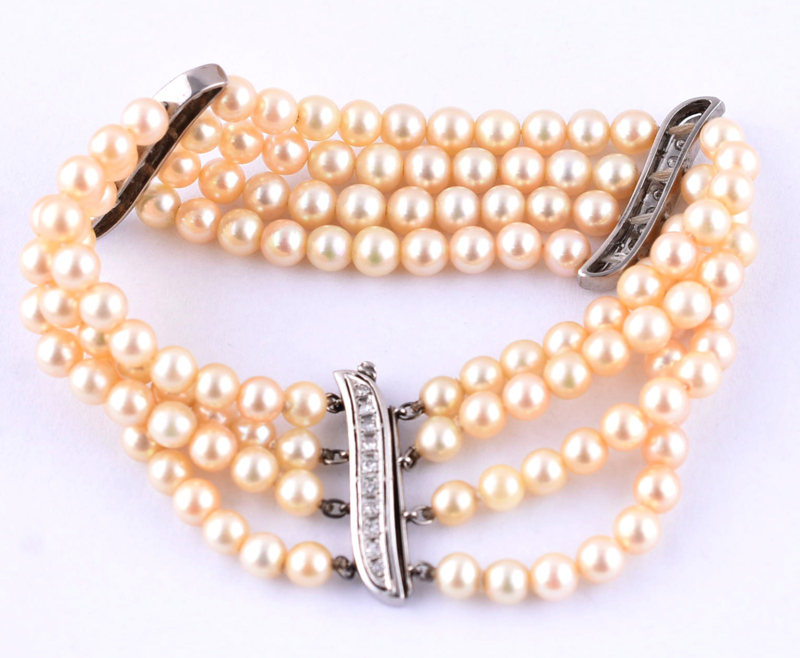 Pulseira de perolas com separações e fecho de platina cravejadas de... - foto 2 de 3