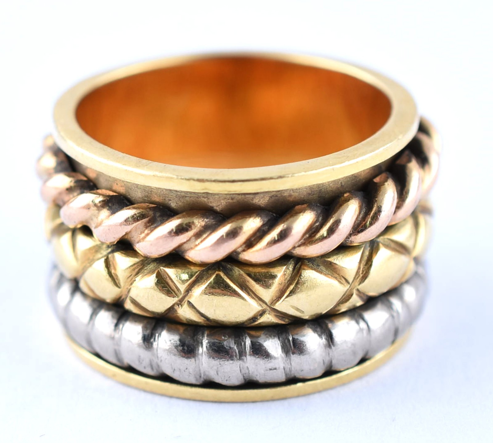 Anel de ouro 18 k com três aros trabalhados em tons diferentes de... - foto 1 de 3