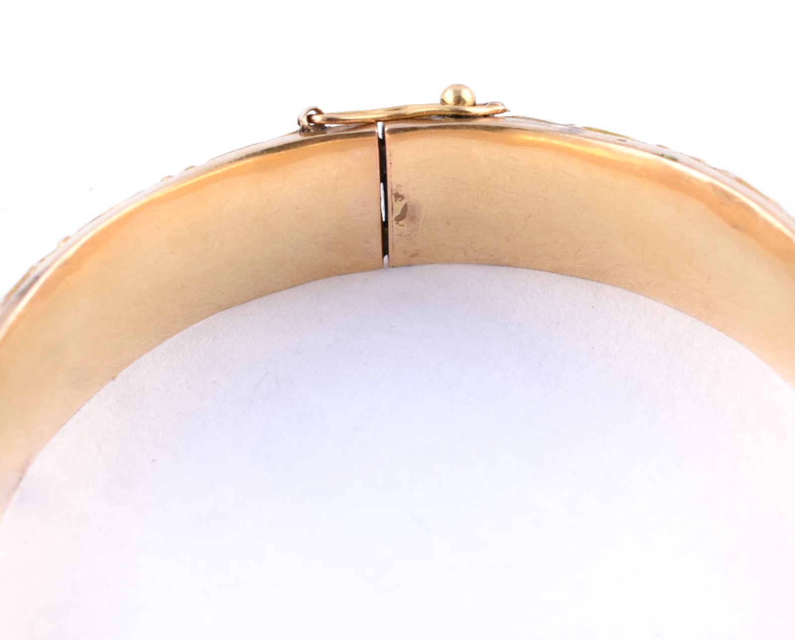 Pulseira "escrava" de ouro 18 k, com folhagens em relevo (Por motivos... - foto 3 de 5