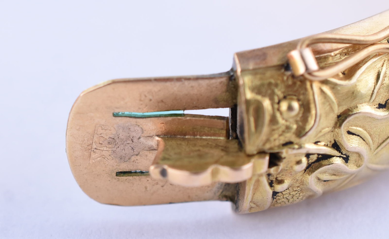 Pulseira "escrava" de ouro 18 k, com folhagens em relevo (Por motivos... - foto 5 de 5