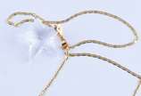 Cordão laminado, com pingente em ouro 18 k, fei... - Cordão laminado, com pingente em ouro 18 k, feitio estrela em cristal translúcido (Por motivos de seguranças as peças não encontram-se na loja)