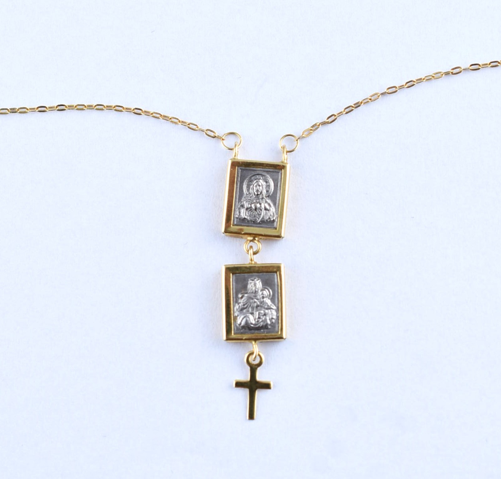 Cordão de ouro 18 k com 3 pingentes,sendo um com imagem de Nossa... - foto 1 de 5