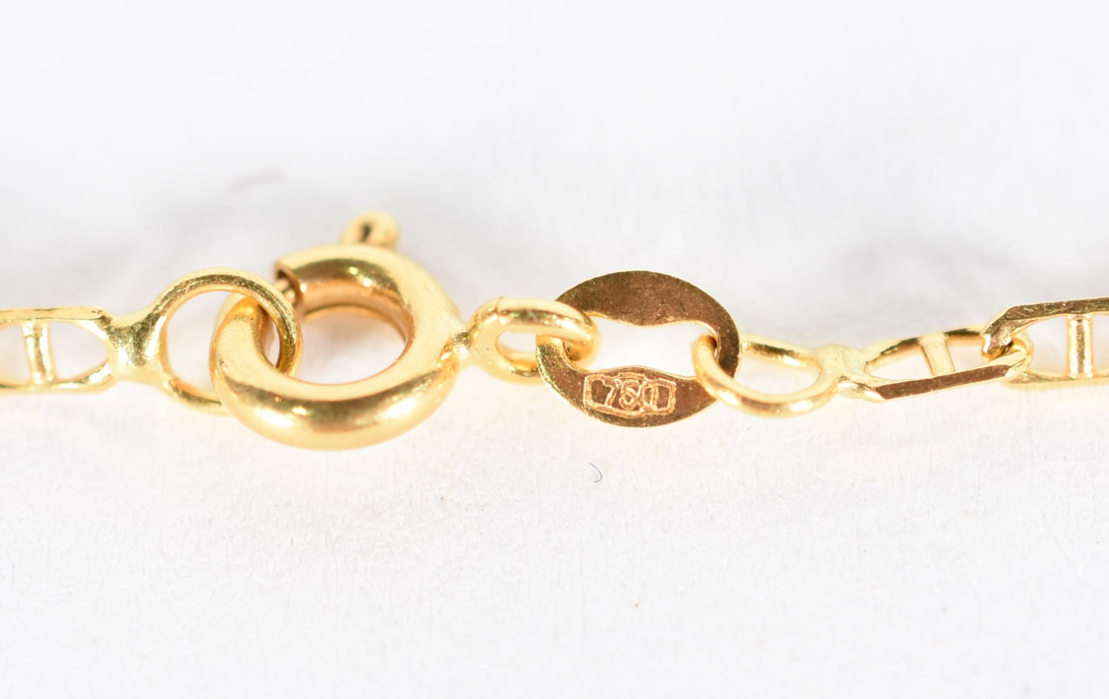 Pulseira de ouro 18 k contrastada, com elos, apresenta um pingente... - foto 3 de 3