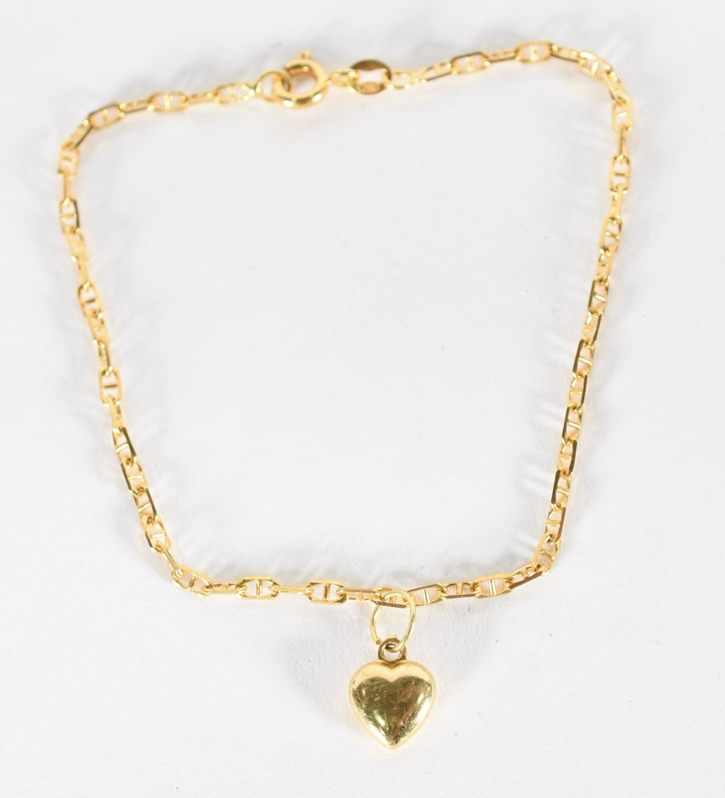 Pulseira de ouro 18 k contrastada, com elos, apresenta um pingente... - foto 2 de 3