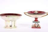 Duas fruteiras de porcelana austríaca decoradas... - Duas fruteiras de porcelana austríaca decoradas em policromia.