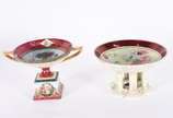 Duas fruteiras de porcelana austríaca decoradas... - Duas fruteiras de porcelana austríaca decoradas em policromia.