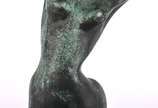 Assinatura não identificada, Figura feminina - Escultura em bronze, datado 1988. Assinada.Medida da escultura: 42 cm/ Medida total: 48 cm.
