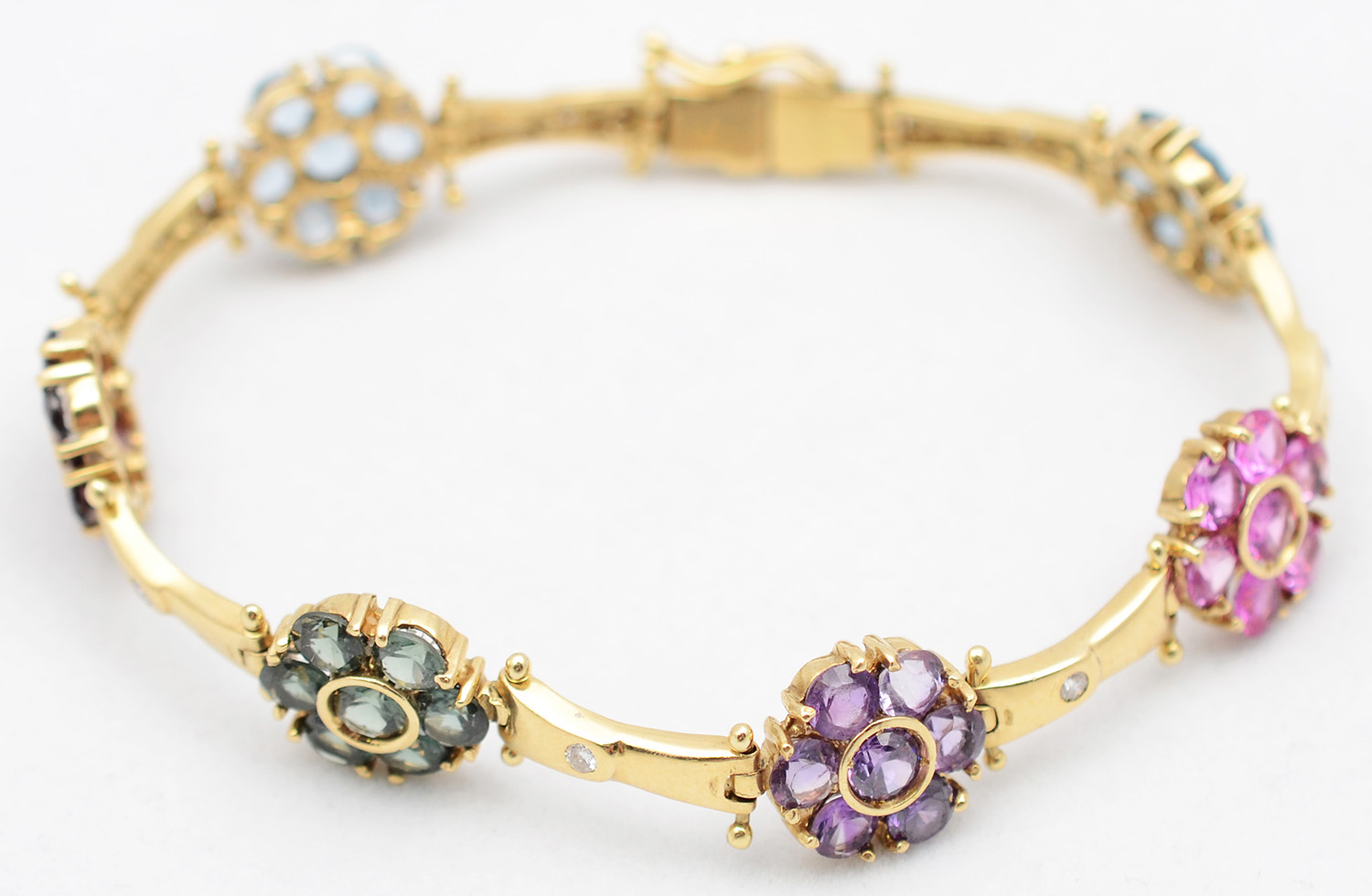Pulseira de ouro amarelo com 5 brilhantes e pedras - foto 1 de 2