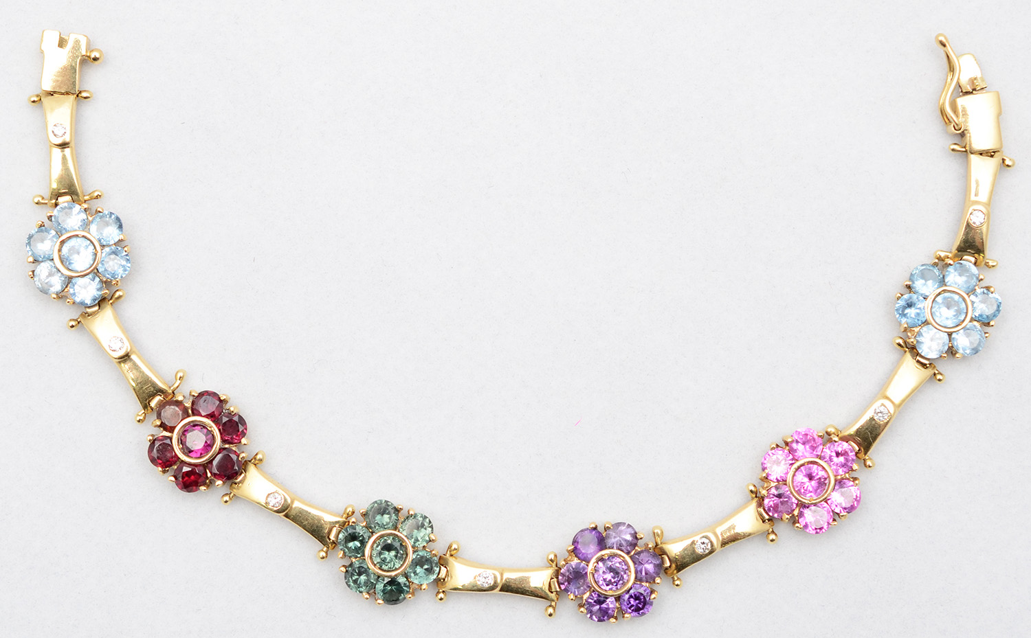 Pulseira de ouro amarelo com 5 brilhantes e pedras - foto 2 de 2
